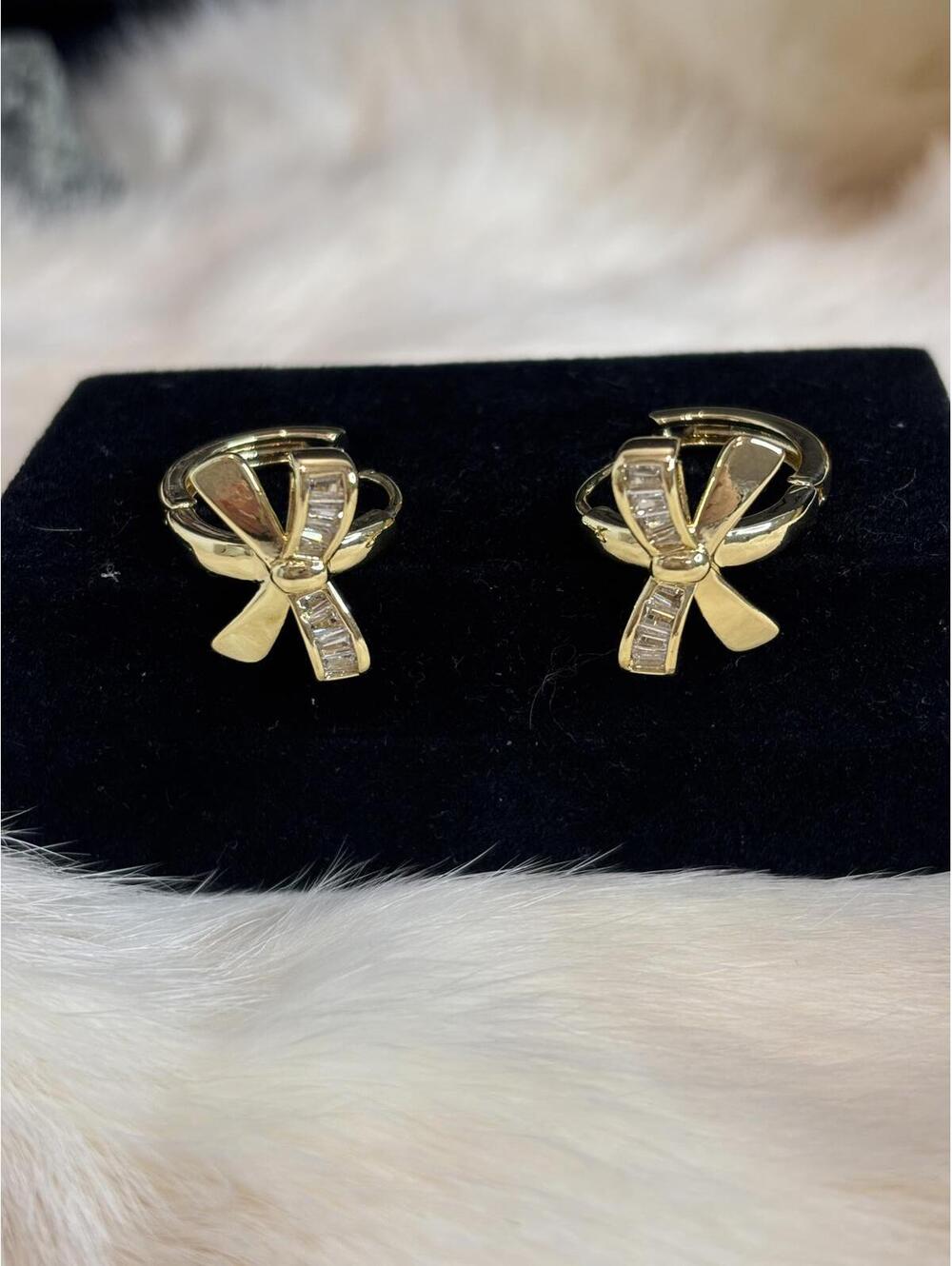 Gold Tone Bow Shaped Clip-On Earrings with Clear Rhinestones
